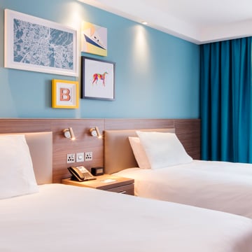 Hampton by Hilton guest bedroom - featuring Astro's Enna reading light