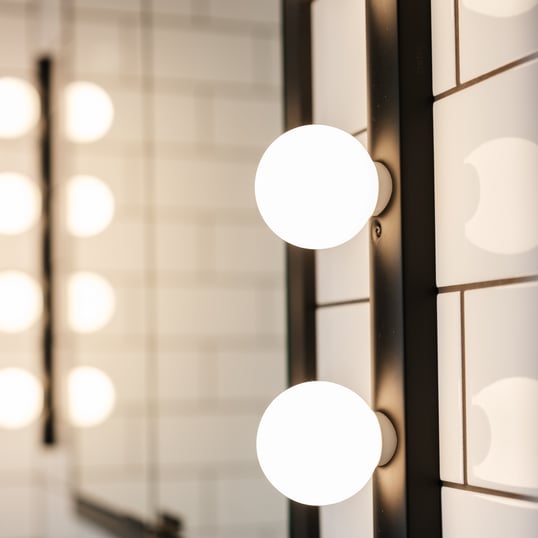 Cabaret Four Featured at a bathroom vanity