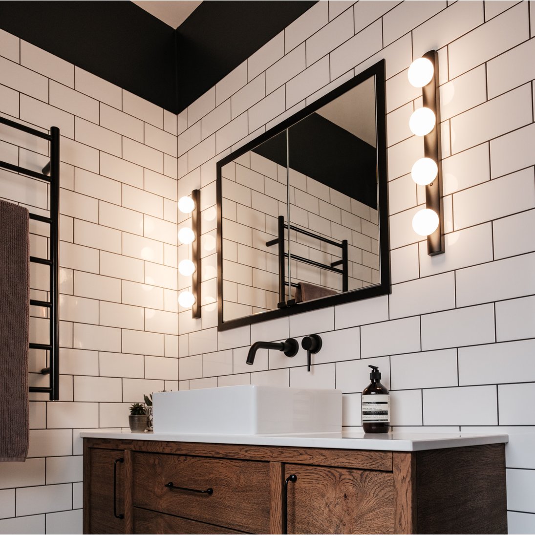 Cabaret Four Featured at a bathroom vanity