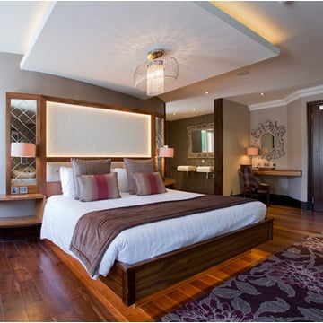 The Busby Hotel guest bedroom, featuring Astro's Ravello Wall